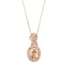 Gemminded 10k Rose Gold Morganite & 1/6 Carat T.W. Diamond Halo Pendant Necklace